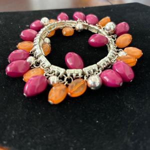 Photo of Vtg 80s Pink And Orange Bead Bracelet