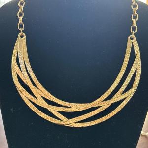 Photo of Women’s gold Tone fashion statement necklace