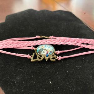 Photo of Frozen Elsa Anna Braided Love Leather Style Pink Silvertone Color Bracelet