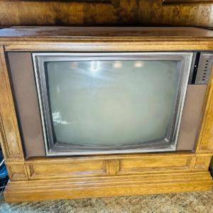 Photo of Vintage Sylvania Superset Television in Wood Shelving