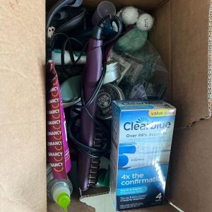 Photo of Box of bathroom supplies