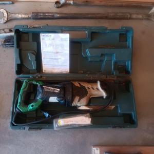 Photo of HITACHI 5" RECIPROCATING SAW WITH BLADES IN A CASE