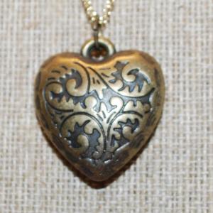 Photo of CLOSED Graphic Designed "Puffy" Heart Locket PENDANT (1¼" x 1") on a Gold Tone 