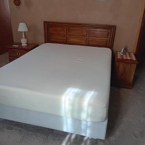 Photo of CLEAN QUEEN SIZE TEMPURPEDIC MATTRESS WITH HEADBOARD AND FRAME