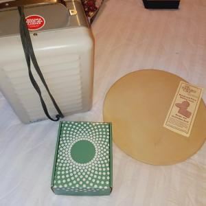 Photo of PAMPERED CHEF PIZZA STONE, ELECTRIC HEATER AND RAINBOW MATE VACUUM ATTACHMENT