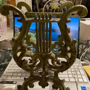 Photo of Vintage Mid-Century Modern 11" Tall Cast Iron Magazine Rack in Good Preowned Con