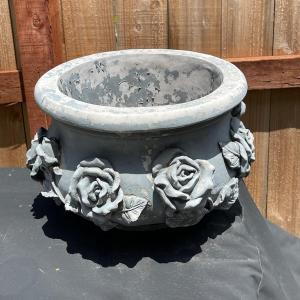 Photo of Plastic Pot approx 12: dia. with rose embellishment