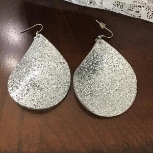 Photo of Silver tone sparkle round earrings