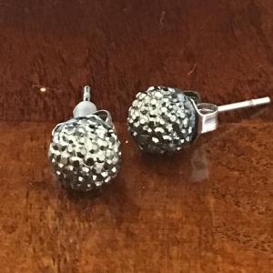 Photo of Small gray colored sparkle stud earrings