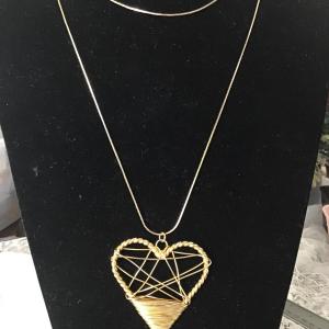 Photo of Gold, toned, heart pendant, long , necklace
