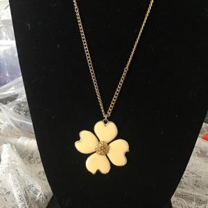 Photo of GT necklace with creme colored flower pendant