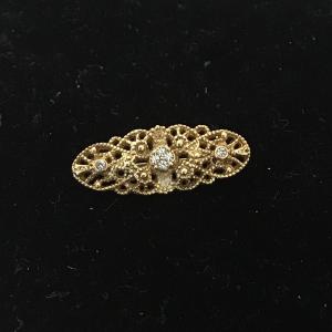 Photo of Vintage gold tone brooch