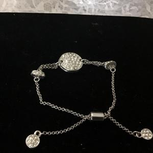 Photo of Silver toned Crystal pull type bracelet