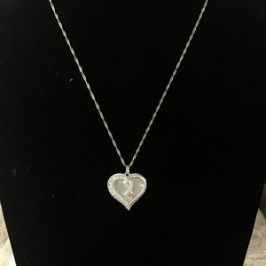 Photo of Silvertone chain heart pendant necklace