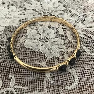 Photo of Gold toned black pearl fashion bangle