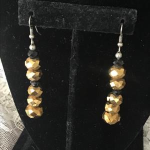 Photo of Black and gold tone elegant earrings