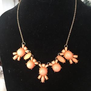 Photo of Coral and gold tone statement Necklace