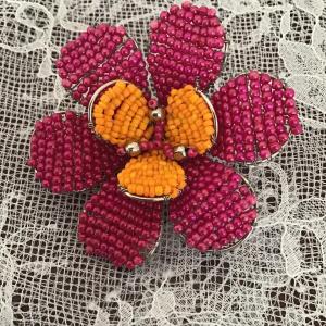 Photo of Pink and orange beaded flower pin