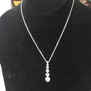 Photo of Passage sparkling faceted stone hearts necklace