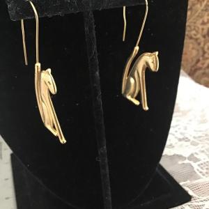 Photo of Gold tone cat earrings