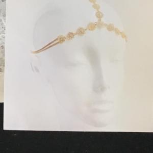 Photo of Gold toned Head chain