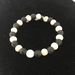 Photo of Black and creme wooden beaded bracelet