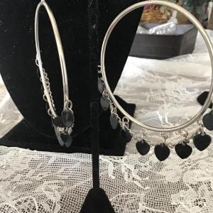 Photo of Silver tone black heart hoop earrings