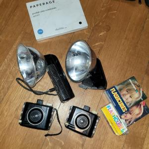 Photo of 2 baby brownie cameras, 2 flashholders, 2 boxes of flashcubes