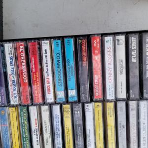 Photo of Lot of cassette tapes and 3 cases