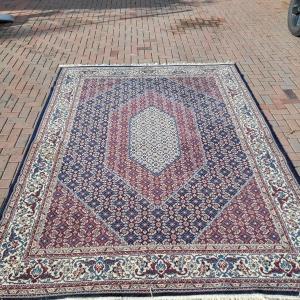 Photo of 2 Persian style rugs