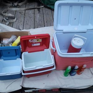 Photo of Collection of coolers and spray bottles, soap dispensers & soap