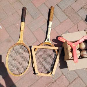 Photo of Vintage and antique tennis rackets, six baseballs and a boomerang
