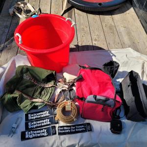 Photo of Lot of storage items, rope bumper stickers, canteen, tub