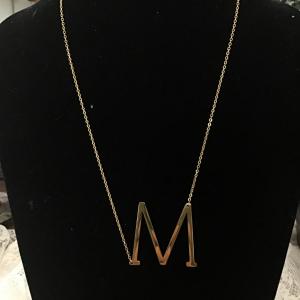 Photo of Gold, toned Costume necklace