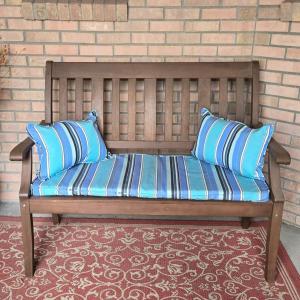 Photo of Outdoor Bench with Blue Stripe Cushions