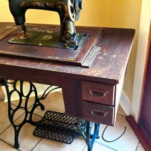 Photo of Vintage Singer Sewing Machine Table with Cast Iron Pedal Base