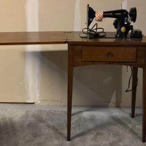 Photo of Singer Sewing Machine in Cabinet Table