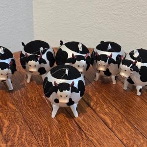 Photo of A Herd of Glass Cow Ornaments
