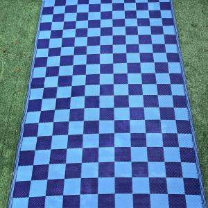 Photo of Blue Checkered Outdoor Rug