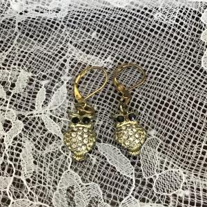 Photo of Gold tone owl earrings rhinestone