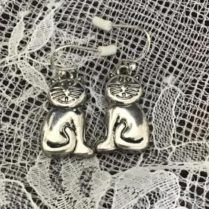 Photo of Silver tone cat fashion earrings