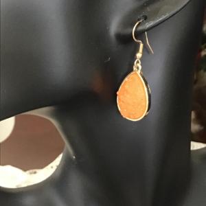 Photo of Orange oval resin earrings