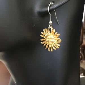 Photo of Gold tone Sun earrings
