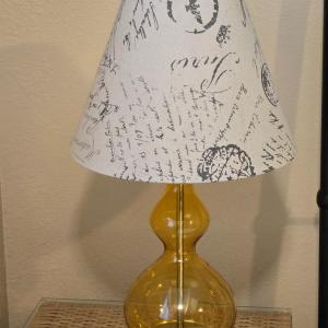 Photo of Yellow Glass Lamp with Paris Theme Shade