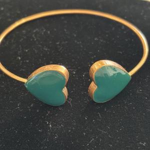 Photo of Copper toned double heart bracelet
