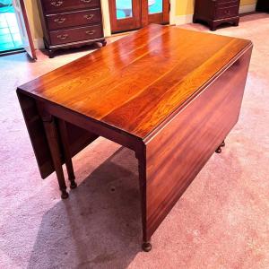 Photo of Vintage Leopold Stickley Solid Cherry Wood Drop Leaf Dining Table with Cover Mat