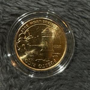 Photo of 2009 Puerto Rico U S quarter gold coin