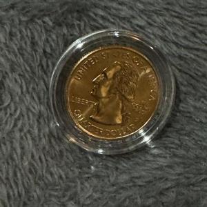 Photo of 2009 Somoa Territories Gold U S quarter coin