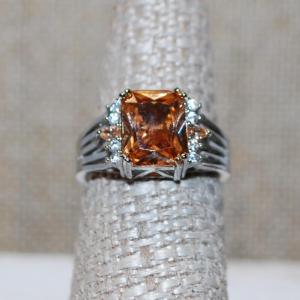 Photo of Size 7¼ Light Amber Square Cut Stone Ring with Side Accents on a .925 Silver Ba
