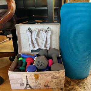 Photo of Hand Weights, Yoga Mat, & Workout DVDs